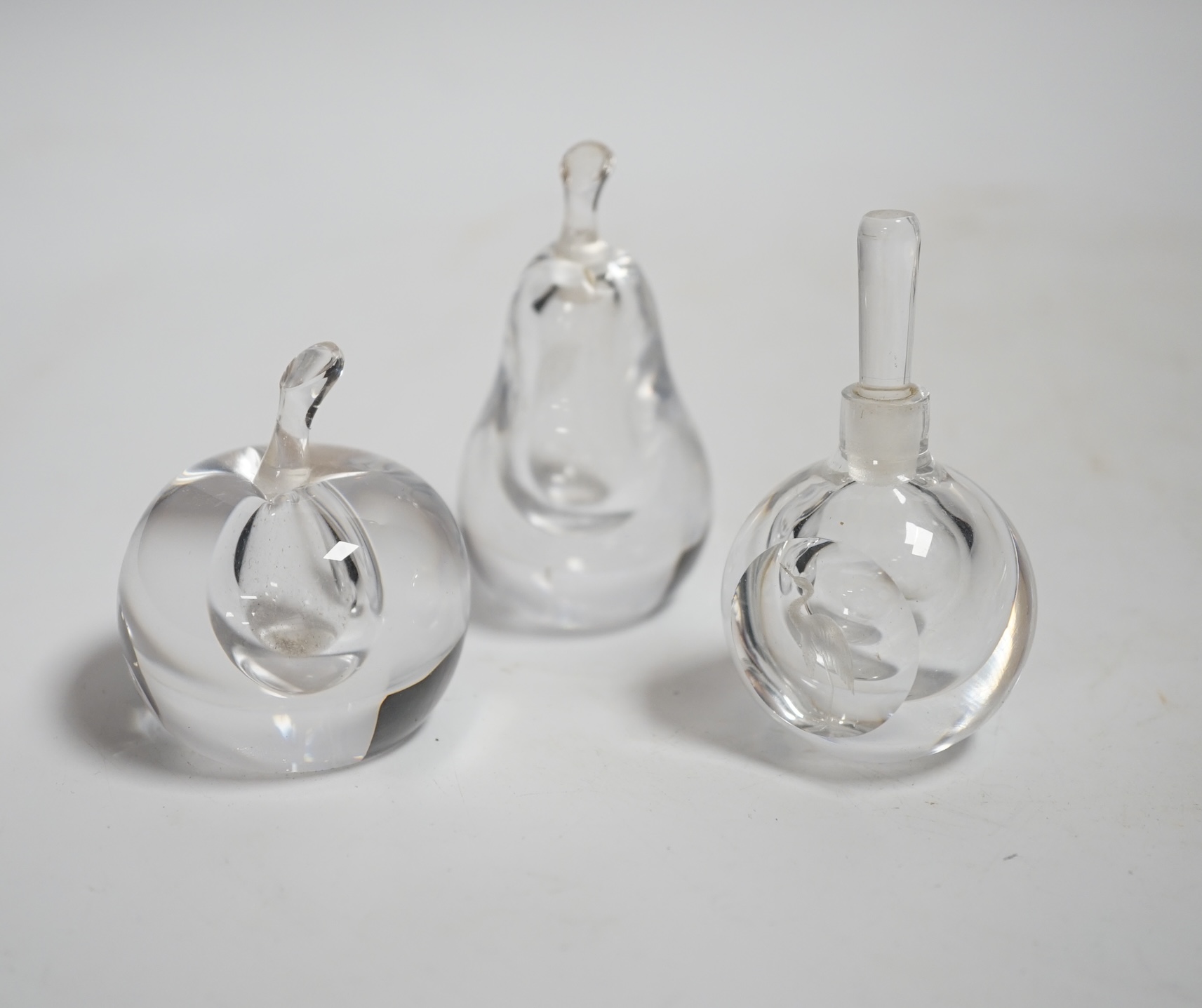 Three Vicke Lindstrand for Kosta Boda glass perfume bottles, tallest 7.5cm